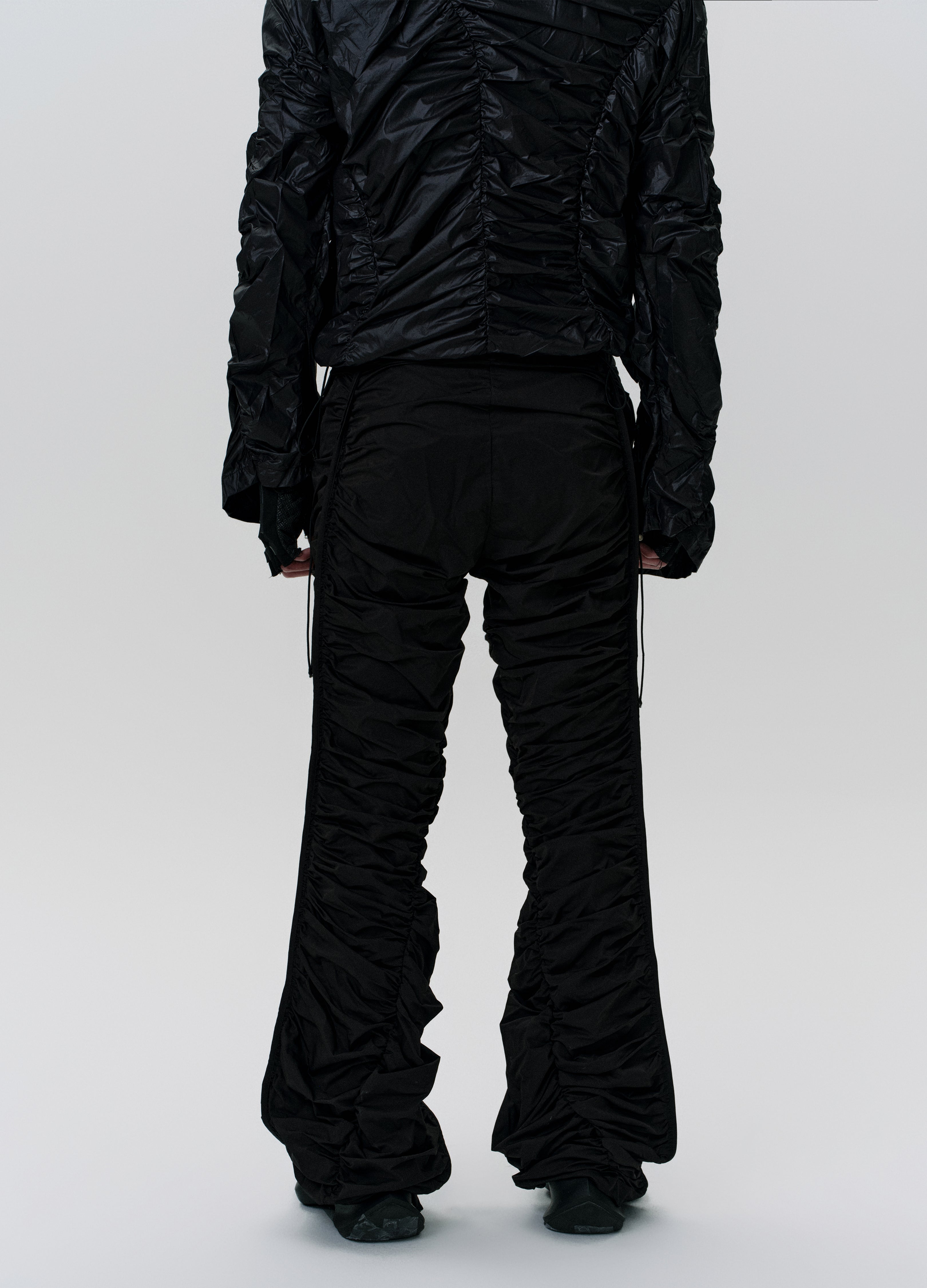 25SS WRINKLE SHELL TECH DARK TROUSERS