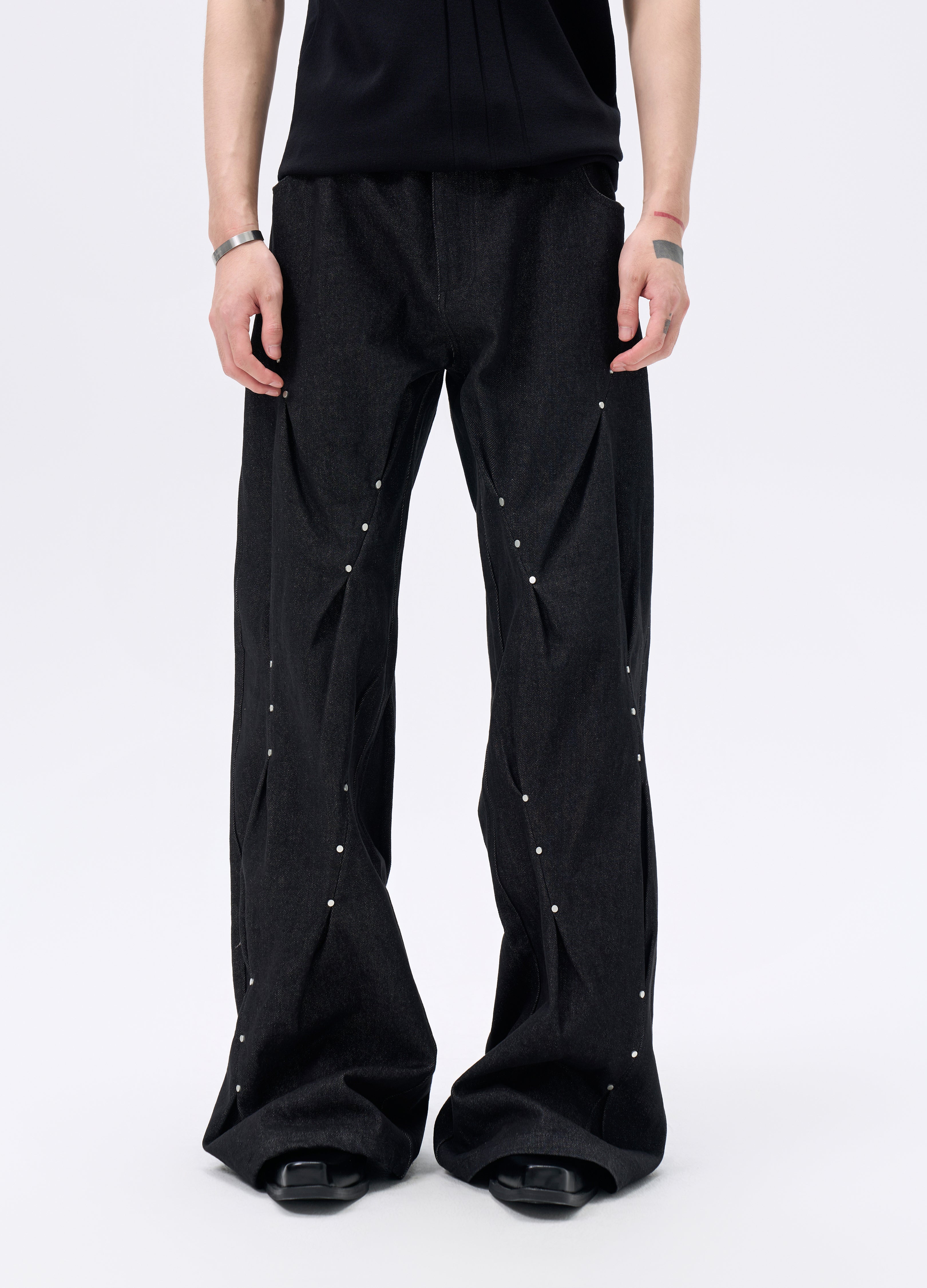 25FW STUDDED TWISTED DENIM TROUSERS