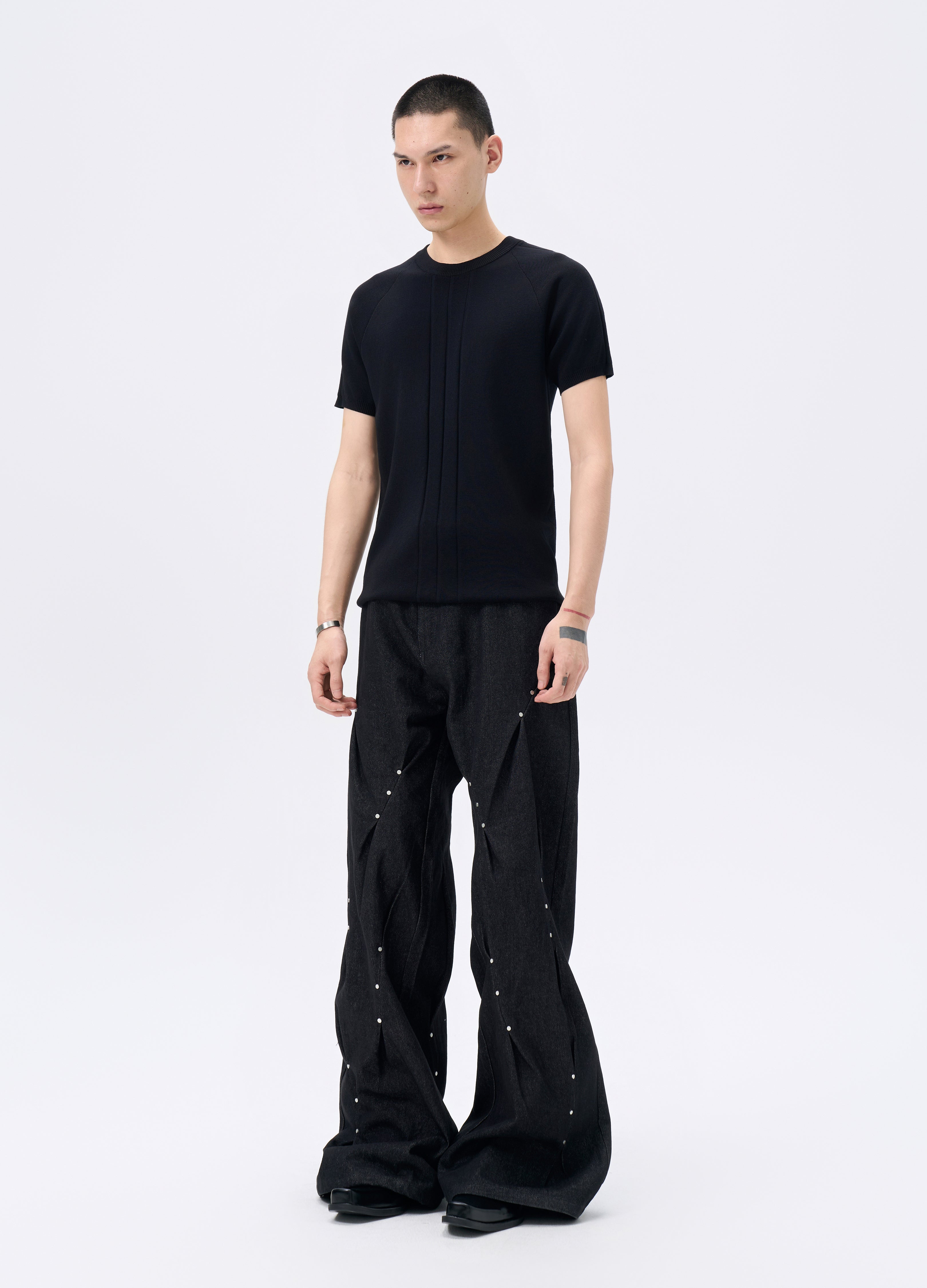 25FW STUDDED TWISTED DENIM TROUSERS