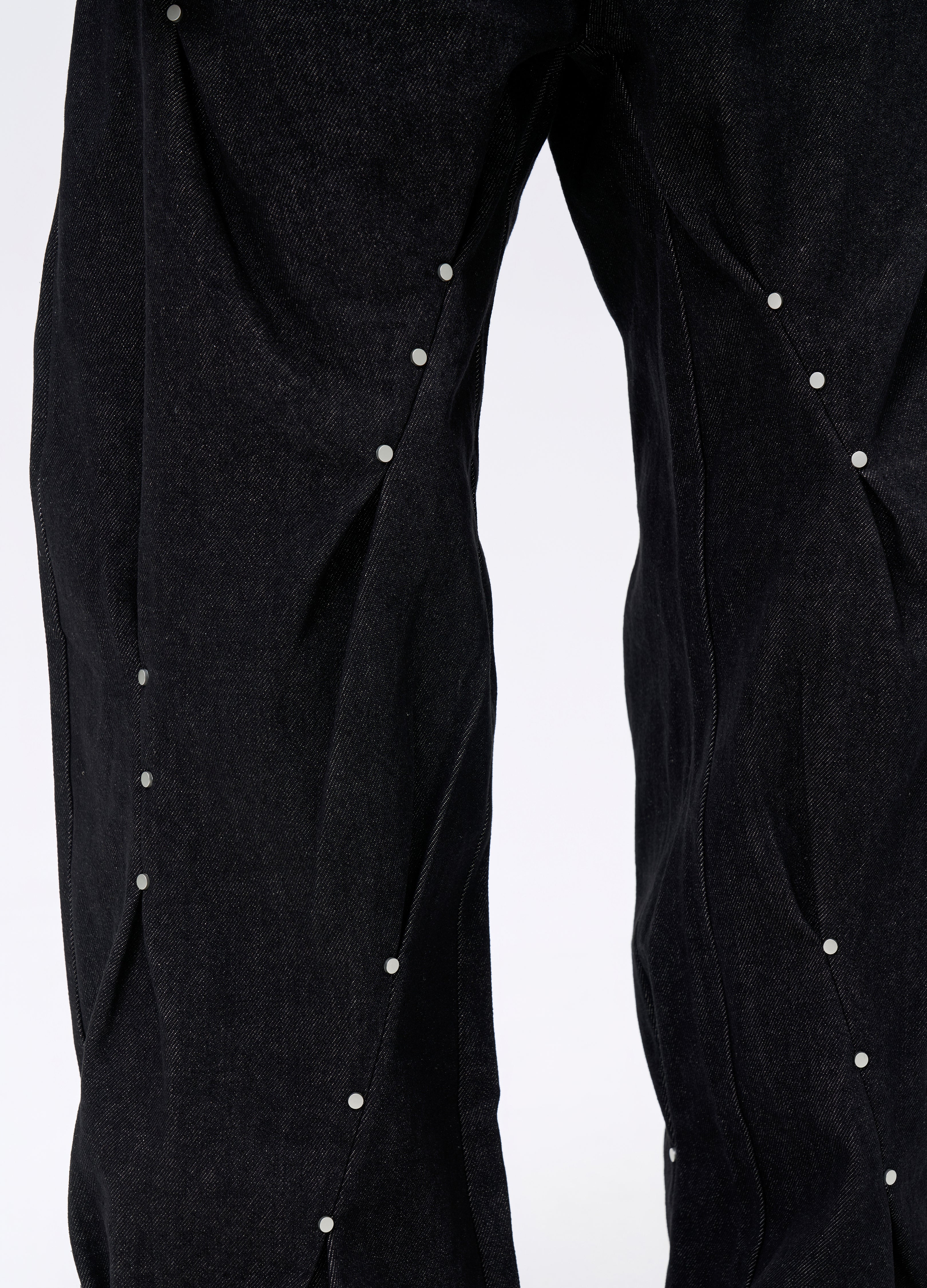25FW STUDDED TWISTED DENIM TROUSERS