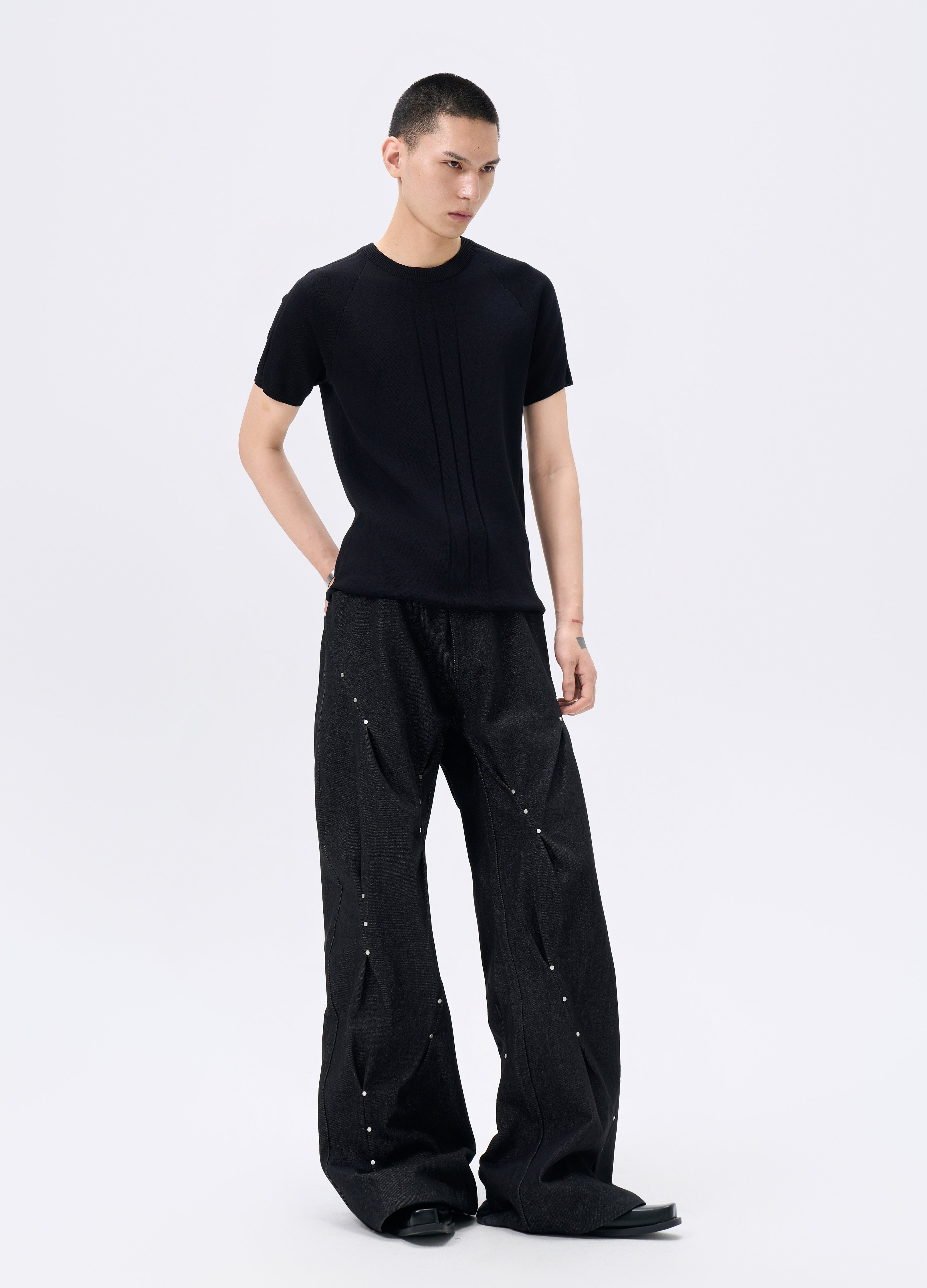 25FW STUDDED TWISTED DENIM TROUSERS