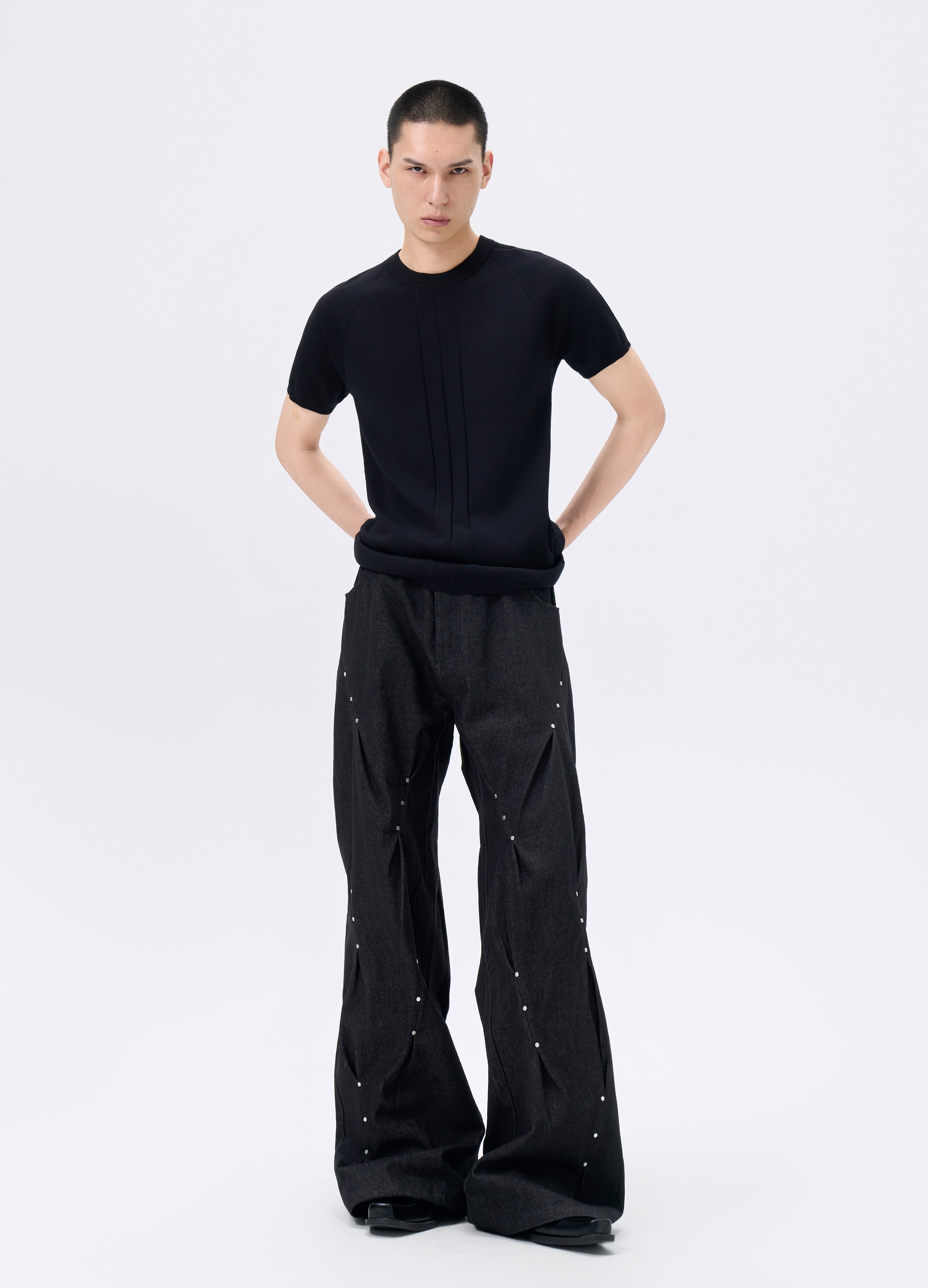 25FW STUDDED TWISTED DENIM TROUSERS