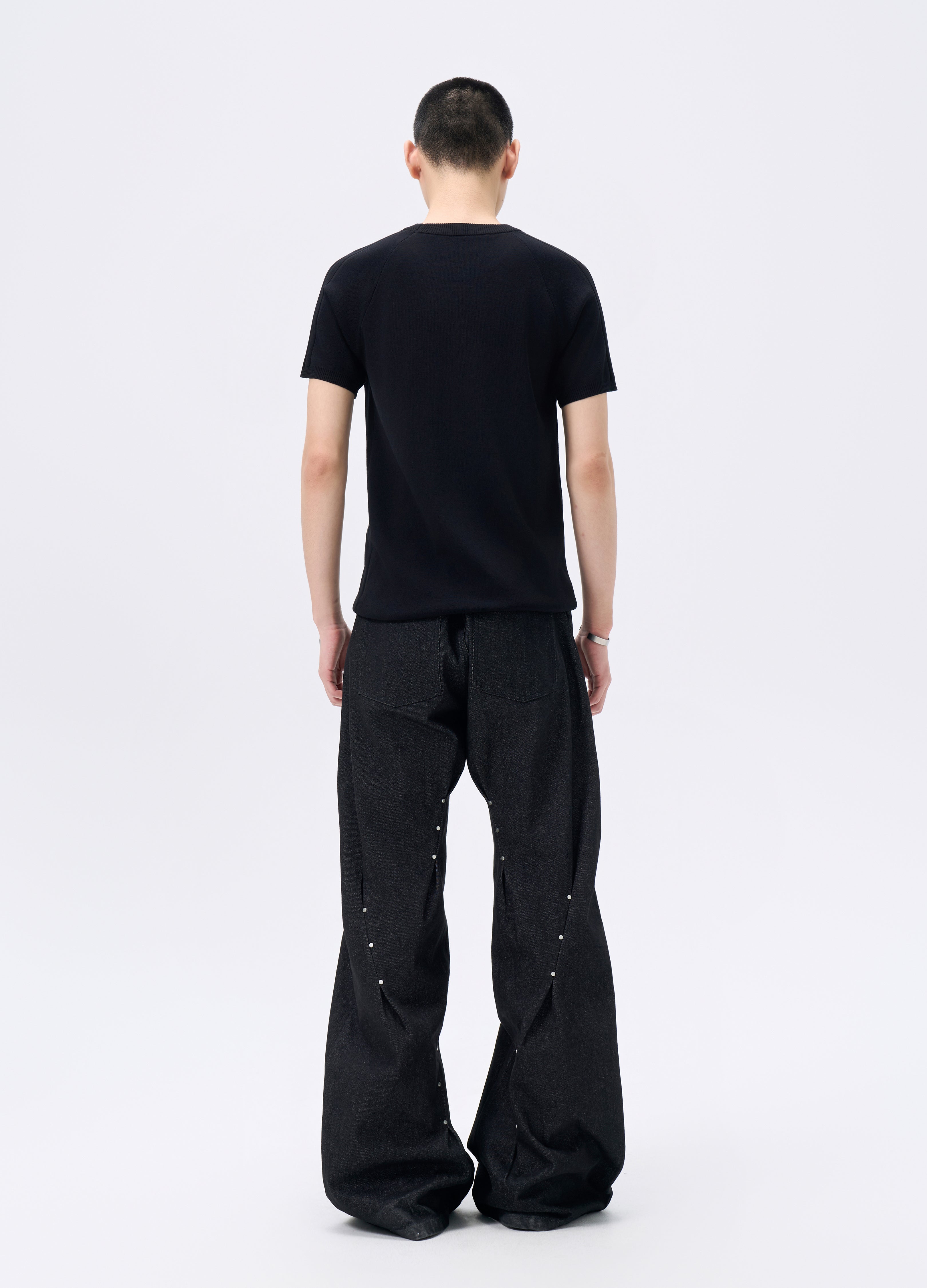 25FW STUDDED TWISTED DENIM TROUSERS