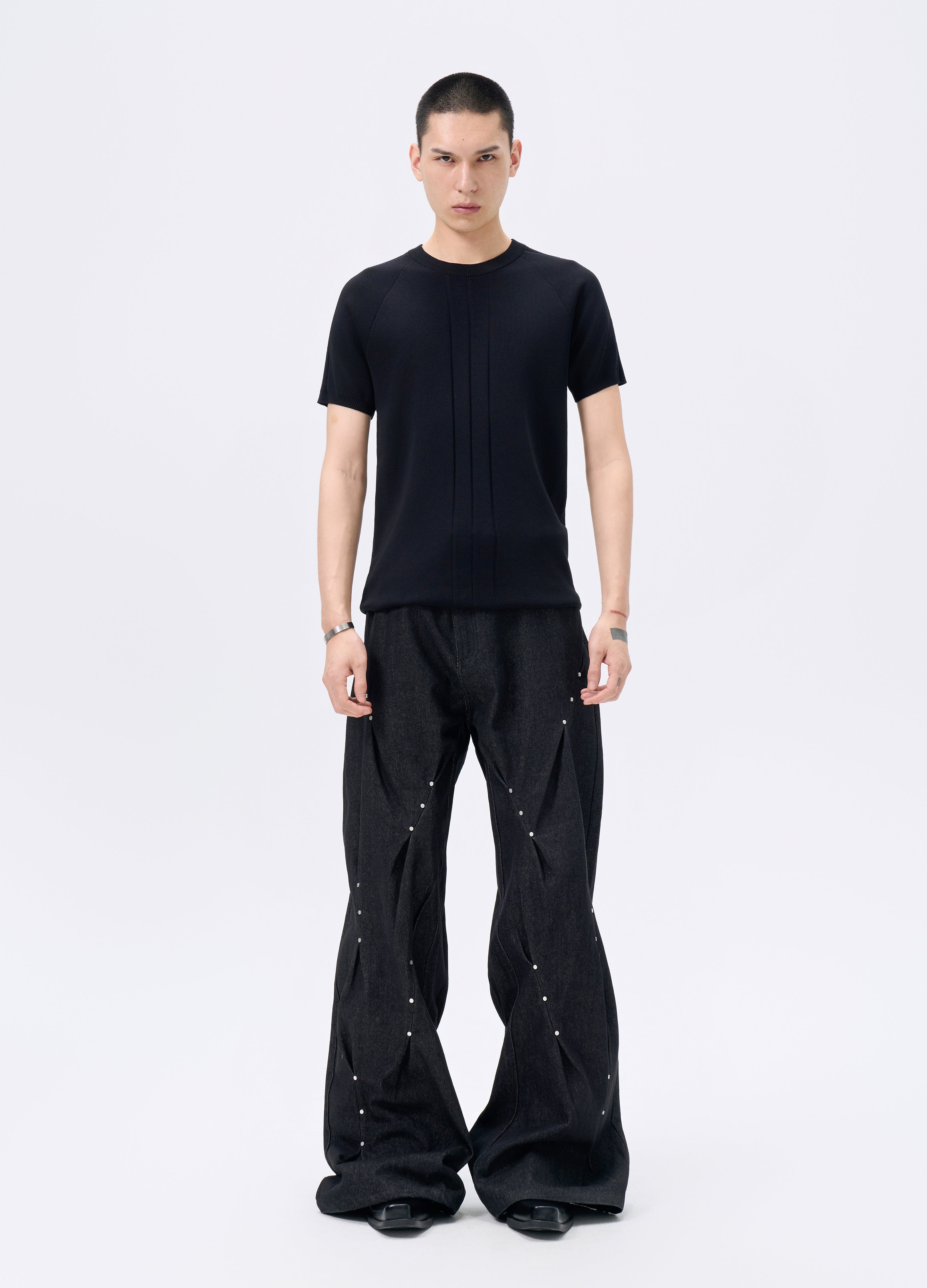 25FW STUDDED TWISTED DENIM TROUSERS